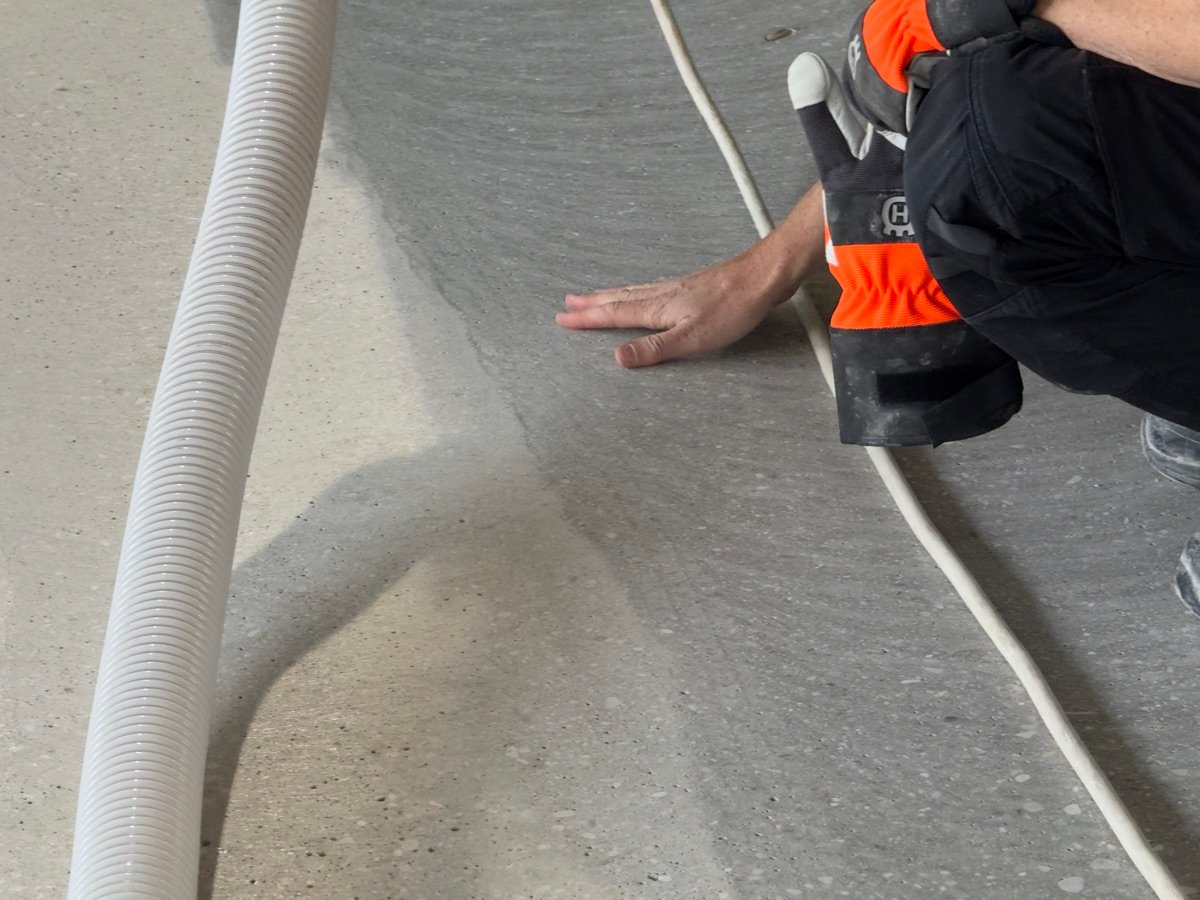 Close-up of Husqvarna grinding machine in action
