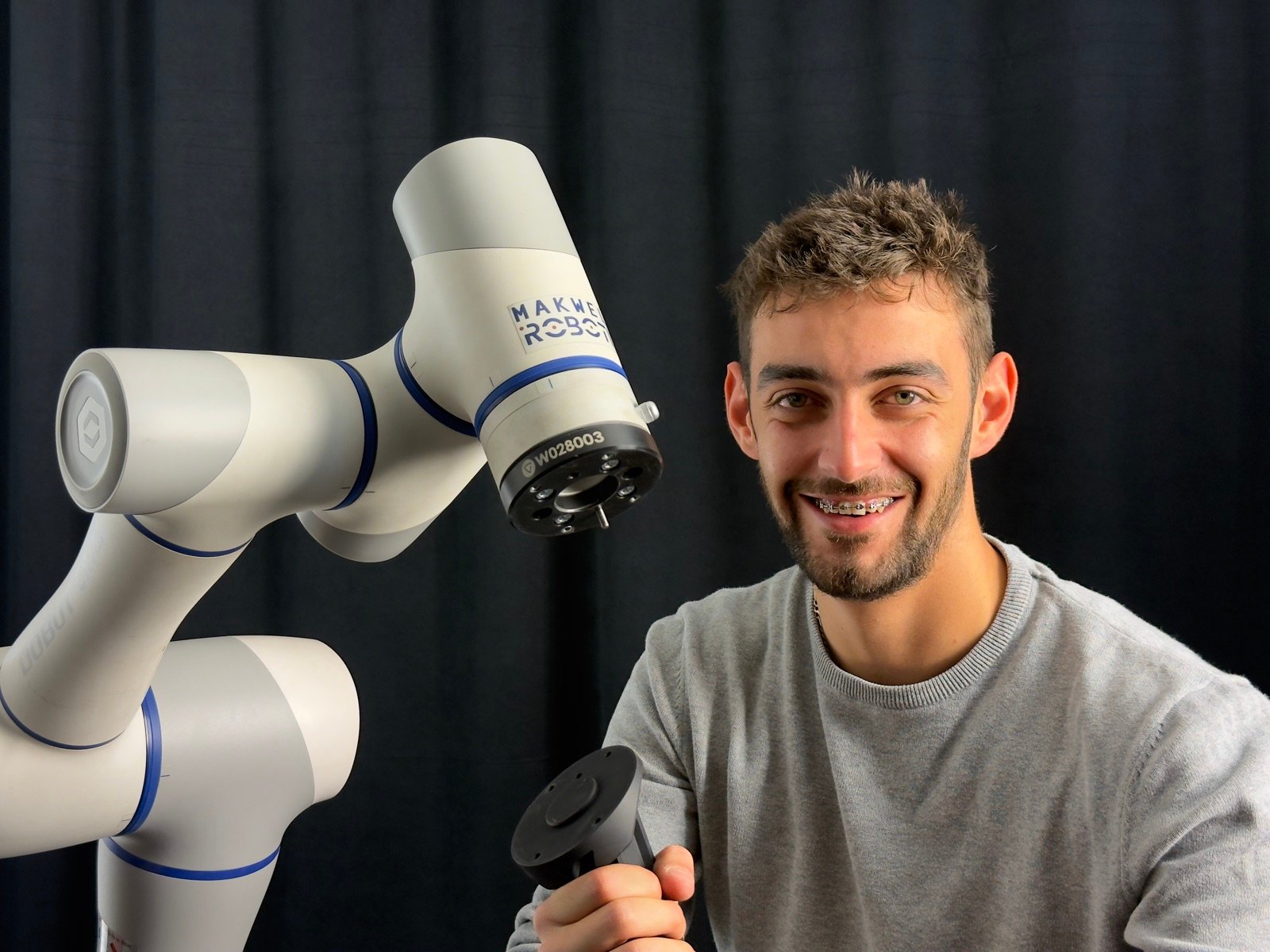 Technician with Makweld Robotix welding robot
